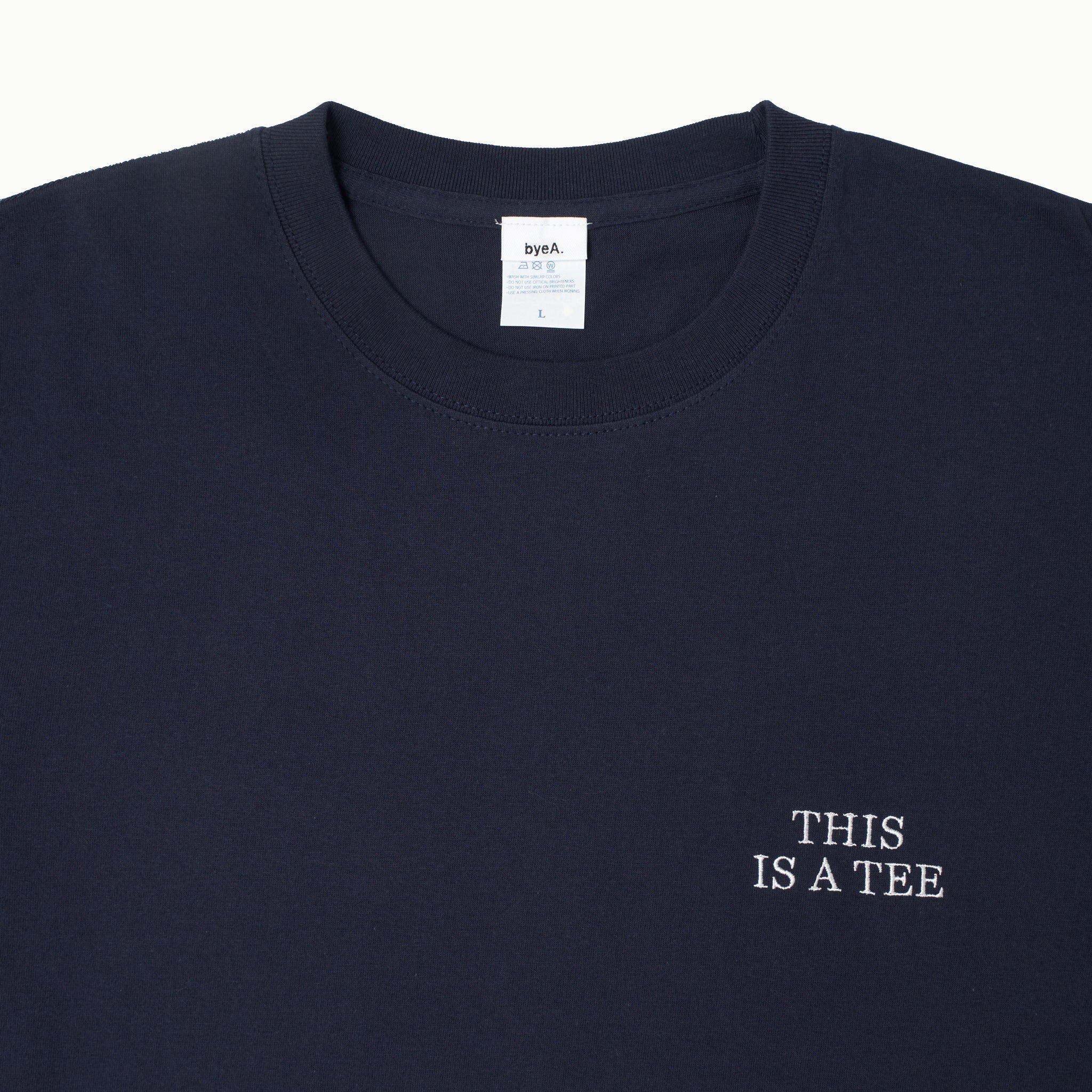 "THIS IS A TEE" TEE NAVY(ティスイズアティーティーネイビー)|byeA.(バイエー)OFFICIAL ONLINE STORE