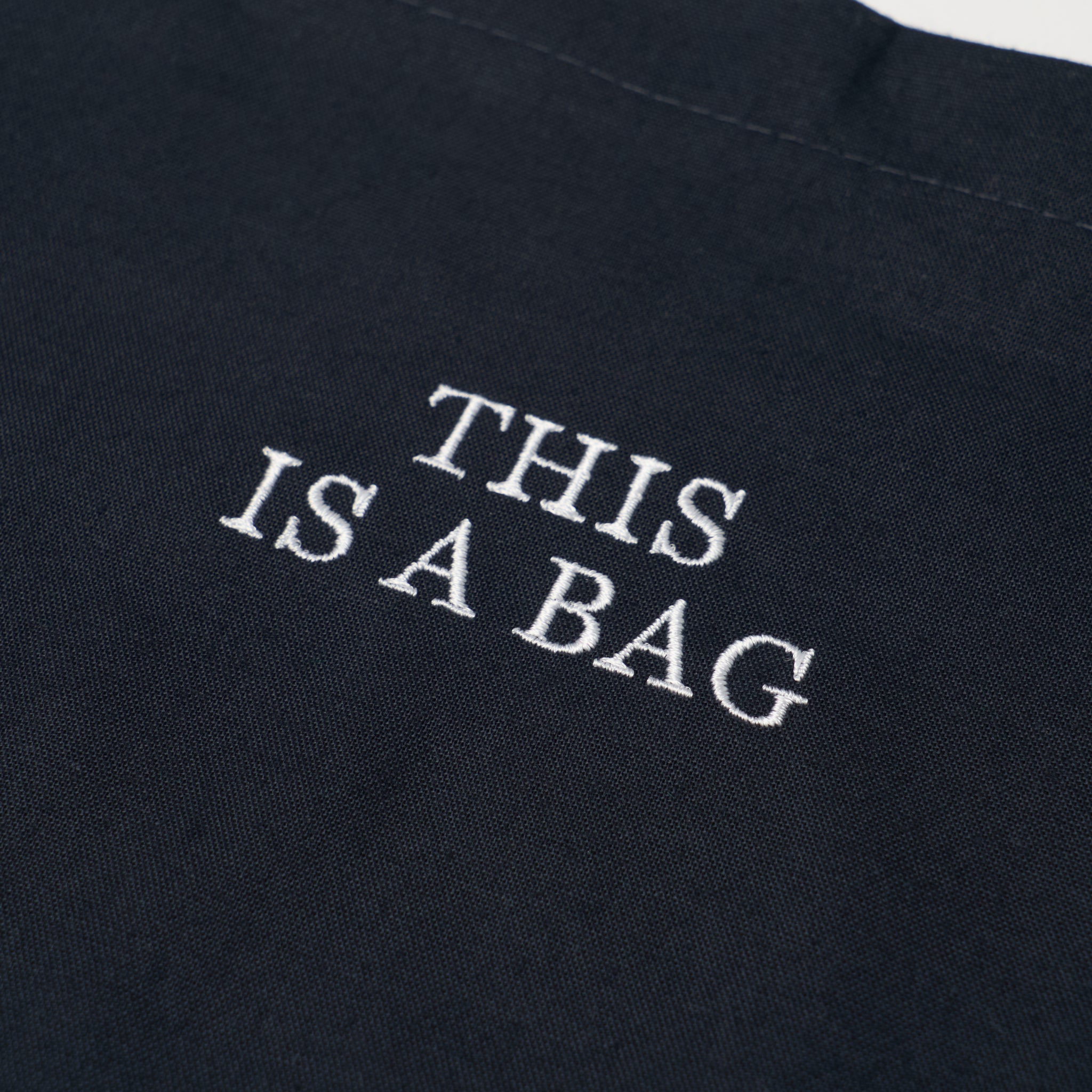 "THIS IS A BAG" BAG NAVY(ディスイズアバッグバッグネイビー)|byeA.(バイエー)OFFICIAL ONLINE STORE